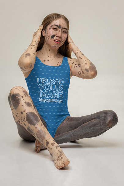 Sublimated Swimsuit Mockup of a Woman Posing in a Studio