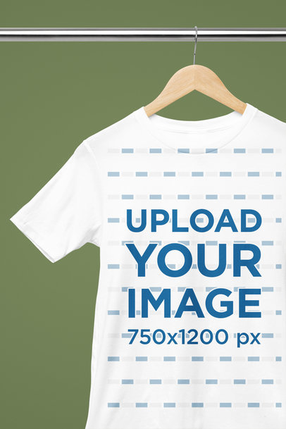 Mockup of a Crewneck Bella Canvas T-Shirt Placed on a Wooden Hanger