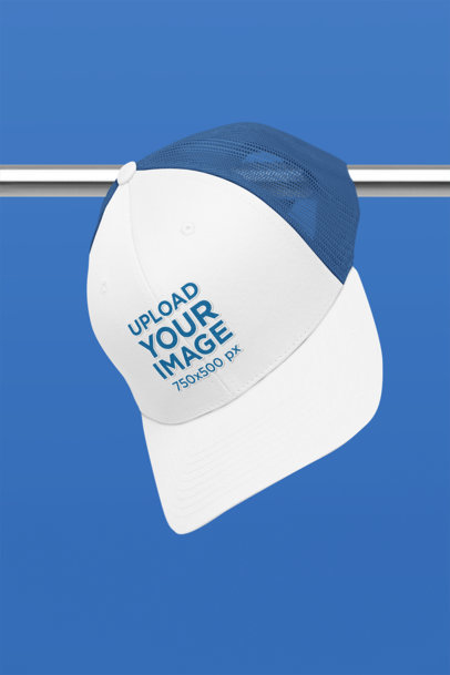 Mockup of a Trucker Hat Hanging from a Steel Bar m33411