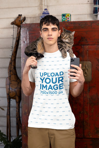 Bella Canvas T-Shirt Mockup Featuring a Man With a Cat Around His Neck