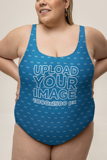 Mockup of a Happy Woman Wearing a Plus-Sized Swimsuit in a Studio