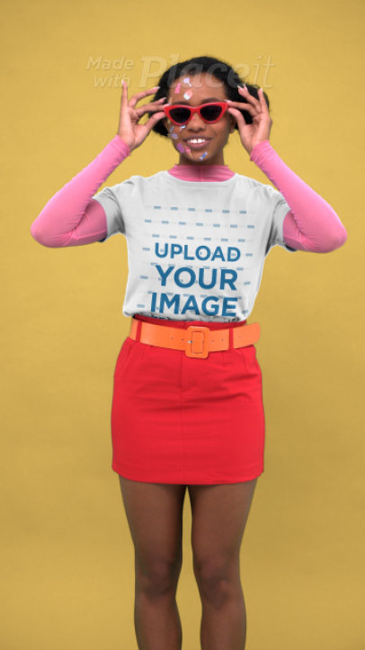 T-Shirt Video Featuring a Happy Woman With Skin Stickers on Her Face