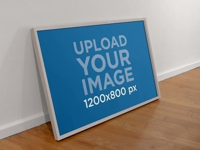 Mockup of an Art Print Placed Over a Wooden Floor
