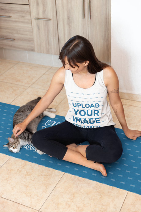 Bella Canvas Tank Top and Yoga Mat Mockup Featuring a Tattooed Woman Petting a Cat