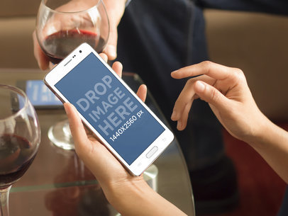 Samsung Galaxy Note Mockup Featuring Woman Using Phone Over Wine