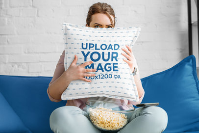 Square Pillow Mockup of a Woman Eating Popcorn on Her Couch m31008 r-el2