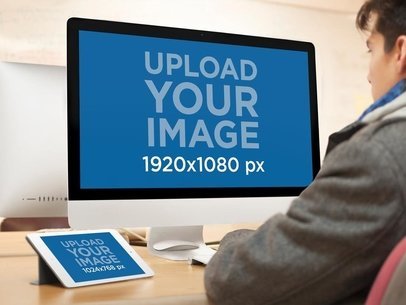 iMac and iPad Mini Mockup Of Man Working at His Desk