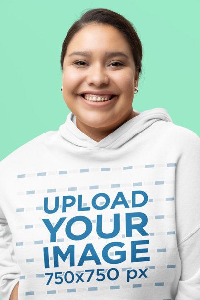 Bella Canvas Cropped Hoodie Mockup Featuring a Joyful Woman in a Studio