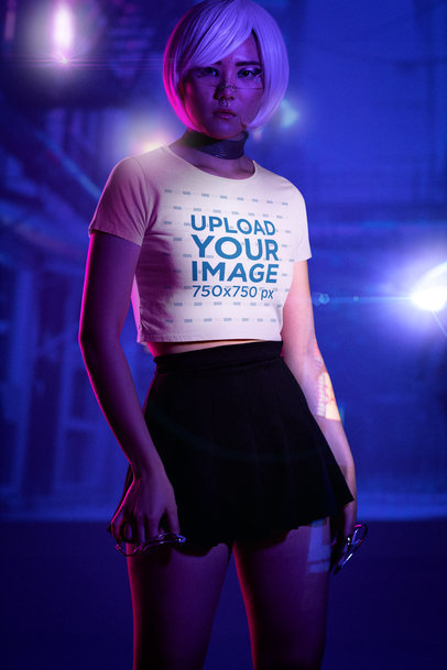 Bella Canvas Crop Top Mockup Featuring a Woman Posing in a Futuristic Setting