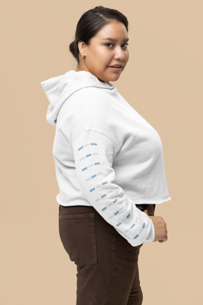Sleeve Mockup Featuring a Woman Wearing a Bella Canvas Cropped Hoodie