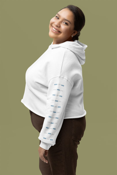 Mockup of a Happy Woman Wearing a Cropped Hoodie With a Customizable Sleeve