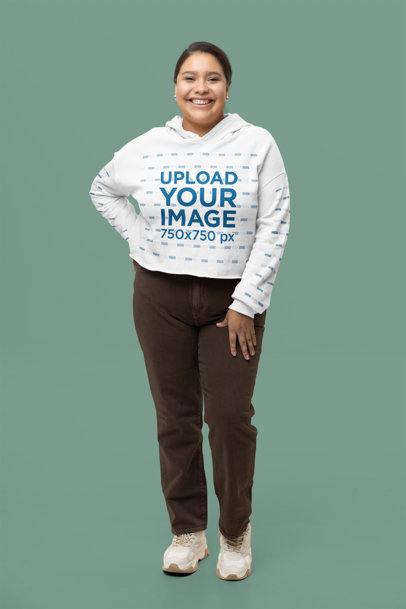 Bella Canvas Cropped Hoodie Mockup of Happy Woman Posing in a Studio