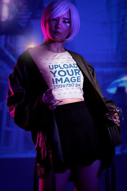 Bella Canvas Crop Top Mockup of a Woman Posing in a Cyberpunk Setting