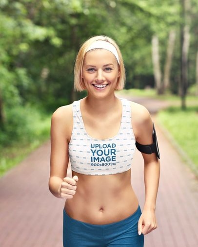 Heathered Sports Bra Mockup Featuring a Joyful Woman Running in a Park