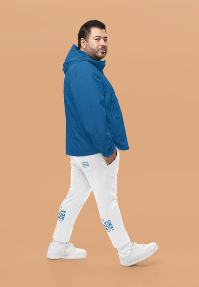 Cotton Heritage Sweatpants Mockup Featuring a Man Walking in a Studio