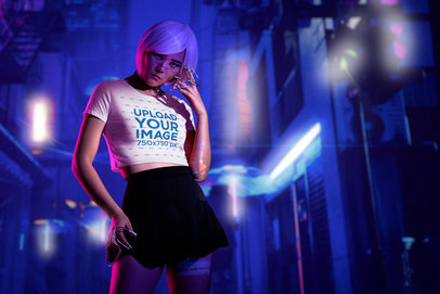 Bella Canvas Crop Top Mockup Featuring a Woman in a Cyberpunk-Inspired Setting m32240