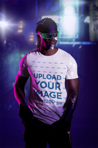 Bella Canvas T-Shirt Mockup Featuring a Serious Man in a Cyberpunk-Themed Setting