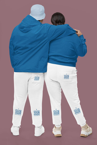 Back-View Cotton Heritage Sweatpants Mockup of a Man and a Woman Hugging Each Other