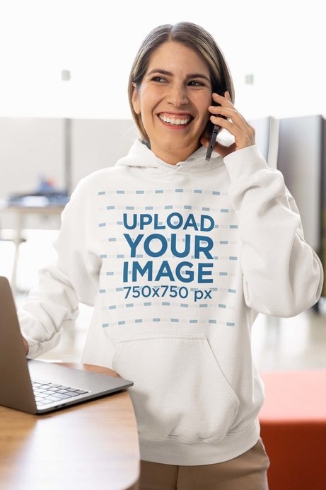 Gildan Hoodie Mockup of a Smiling Woman Talking on the Phone