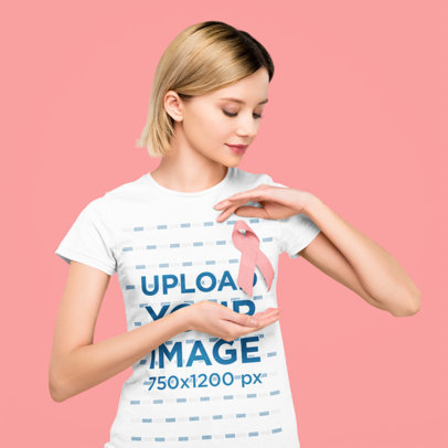 T-Shirt Mockup of a Woman Wearing a Breast Cancer Awareness-Inspired Ribbon
