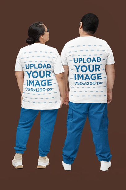 Back-View Mockup of a Couple Wearing Bella Canvas T-Shirts