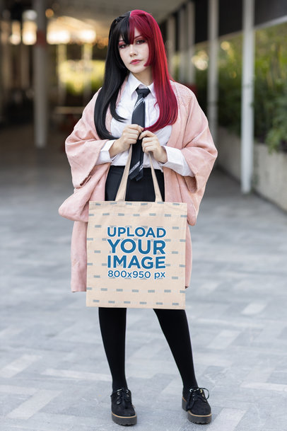 Tote Bag Mockup of a Woman with Bi-Color Hair Wearing a Harajuku-Inspired Outfit