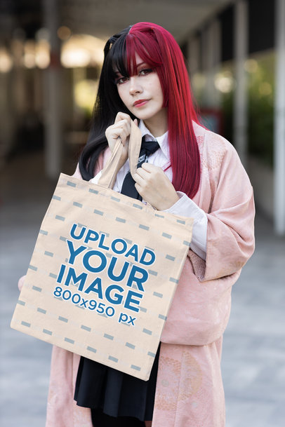 Tote Bag Mockup Featuring a Woman Wearing a Harajuku-Inspired Outfit