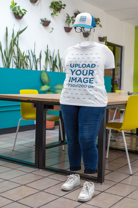 Round-Neck Tee Mockup of a Ghosted Woman Wearing a Trucker Hat in a Dining Room