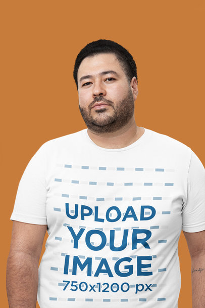 Mockup of a Bearded Man at a Studio Wearing a Crewneck Bella Canvas T-Shirt
