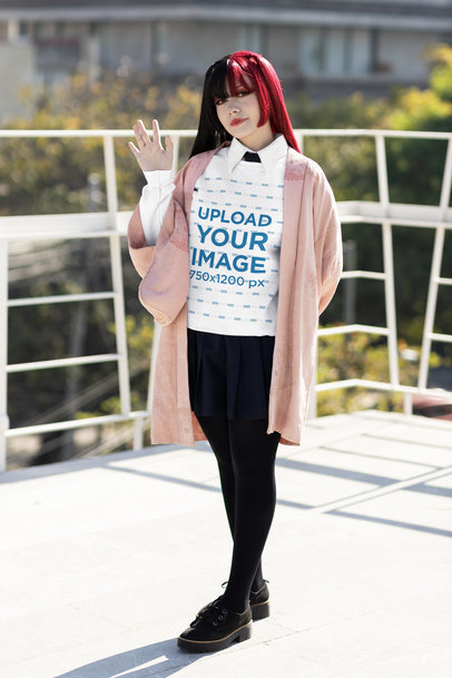 Gildan Sweatshirt Mockup Featuring a Cosplay Woman Waving in a Balcony