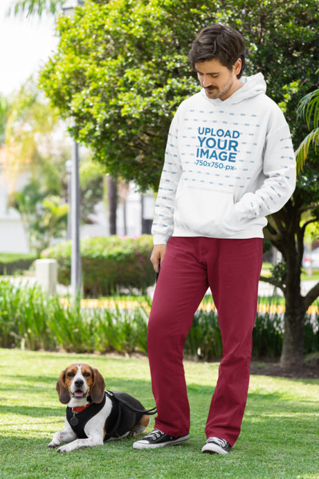 Gildan Hoodie Mockup Featuring a Man Standing Next to His Dog