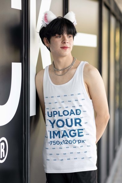 Bella Canvas Tank Top Mockup of a Man with Cat Ears Inspired by a Harajuku Aesthetic