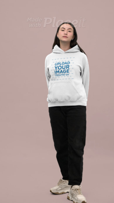 Gildan Pullover Hoodie Video of a Woman Posing in a Colorful Background