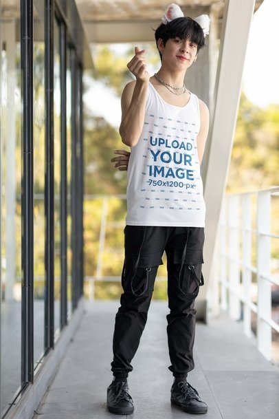 Bella Canvas Tank Top Mockup Featuring a Smiling Man Doing a Korean Heart Sign
