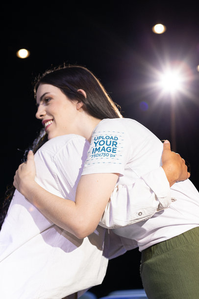 Bella Canvas T-Shirt Sleeve Mockup Featuring a Happy Woman Hugging Someone