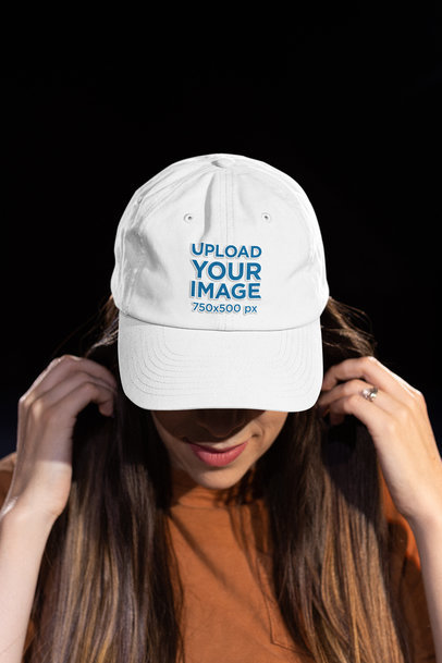 Mockup of a Woman with Long Hair Wearing an Embroidered Dad Hat