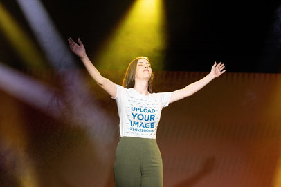 Bella Canvas T-Shirt Mockup of a Woman Praying with Her Arms Wide Open