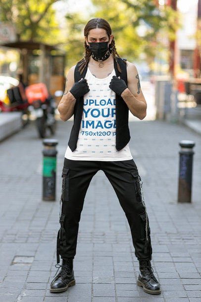 Tank Top Mockup of a Tattooed Man in a Harajuku-Inspired Outfit Posing on the Street