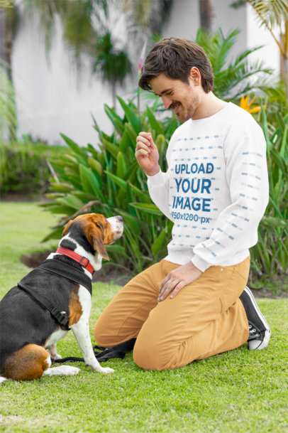 Gildan Sweatshirt Mockup of a Happy Bearded Man Training His Dog