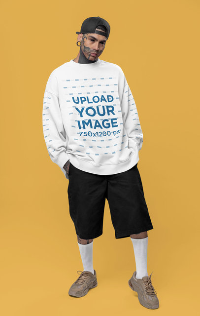 Oversized Sweatshirt Mockup of a Man with an Alternative-Style Look and Face Tattoos