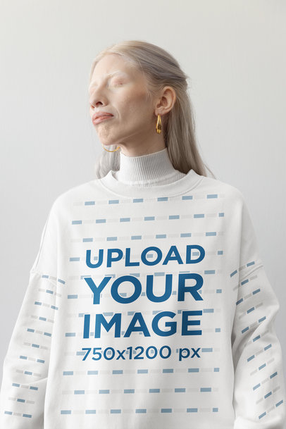 Oversized Sweatshirt Mockup Featuring a Woman Posing With Her Eyes Closed  m31715