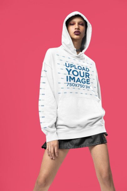 Mockup of a Woman in an Alternative-Style Outfit Wearing an Oversized Hoodie