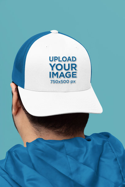 Mockup of a Yupoong Trucker Hat Featuring a Man