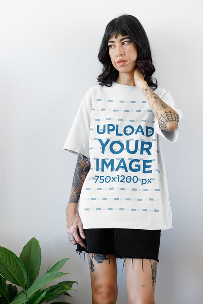 Oversized Tee Mockup of a Tattooed Woman With an Alternative-Styled Outfit