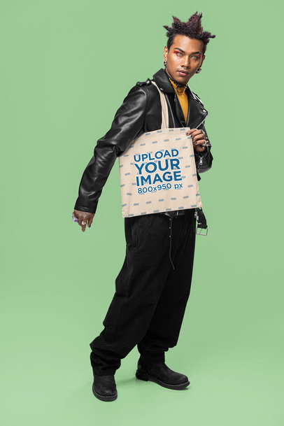 Mockup of a Man with an Alternative Outfit Carrying a Tote Bag