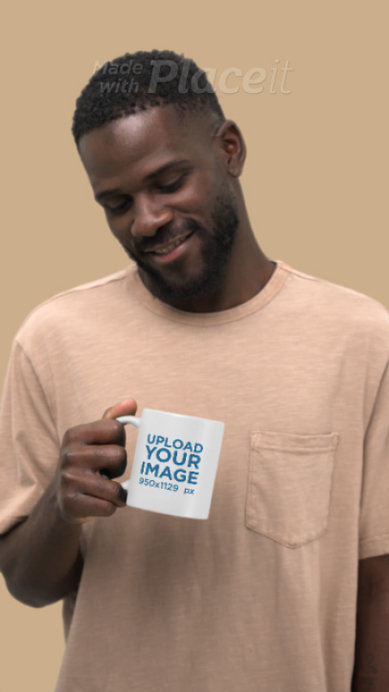 Video of a Happy Man Holding an 11 Oz Coffee Mug