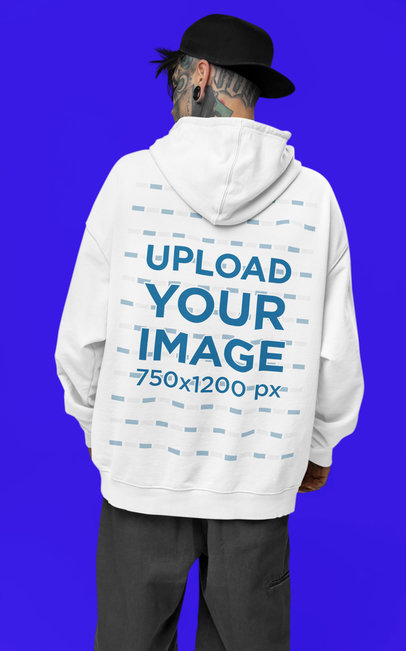 Back-View Mockup of a Man with a Tattooed Face Wearing an Oversized Hoodie