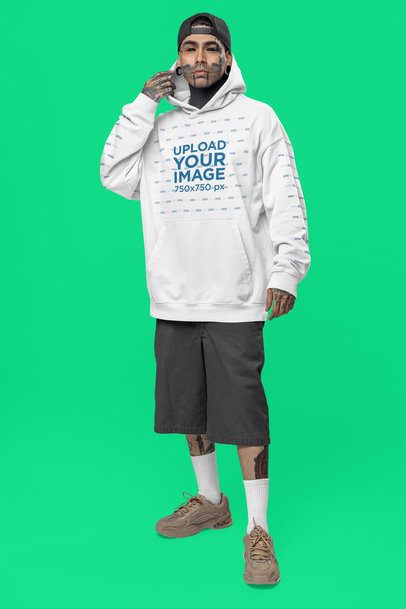 Oversized Hoodie Mockup of a Tattooed Man Posing in a Studio With an Alternative Look m31666