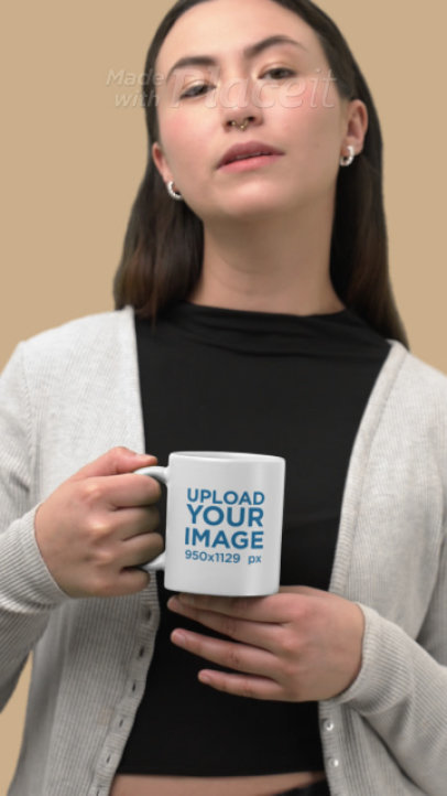 Video of a Serious Woman Holding a Coffee Mug