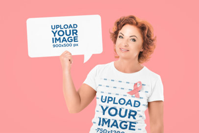 T-Shirt Mockup of a Woman Holding a Flyer in Support of Cancer Awareness
